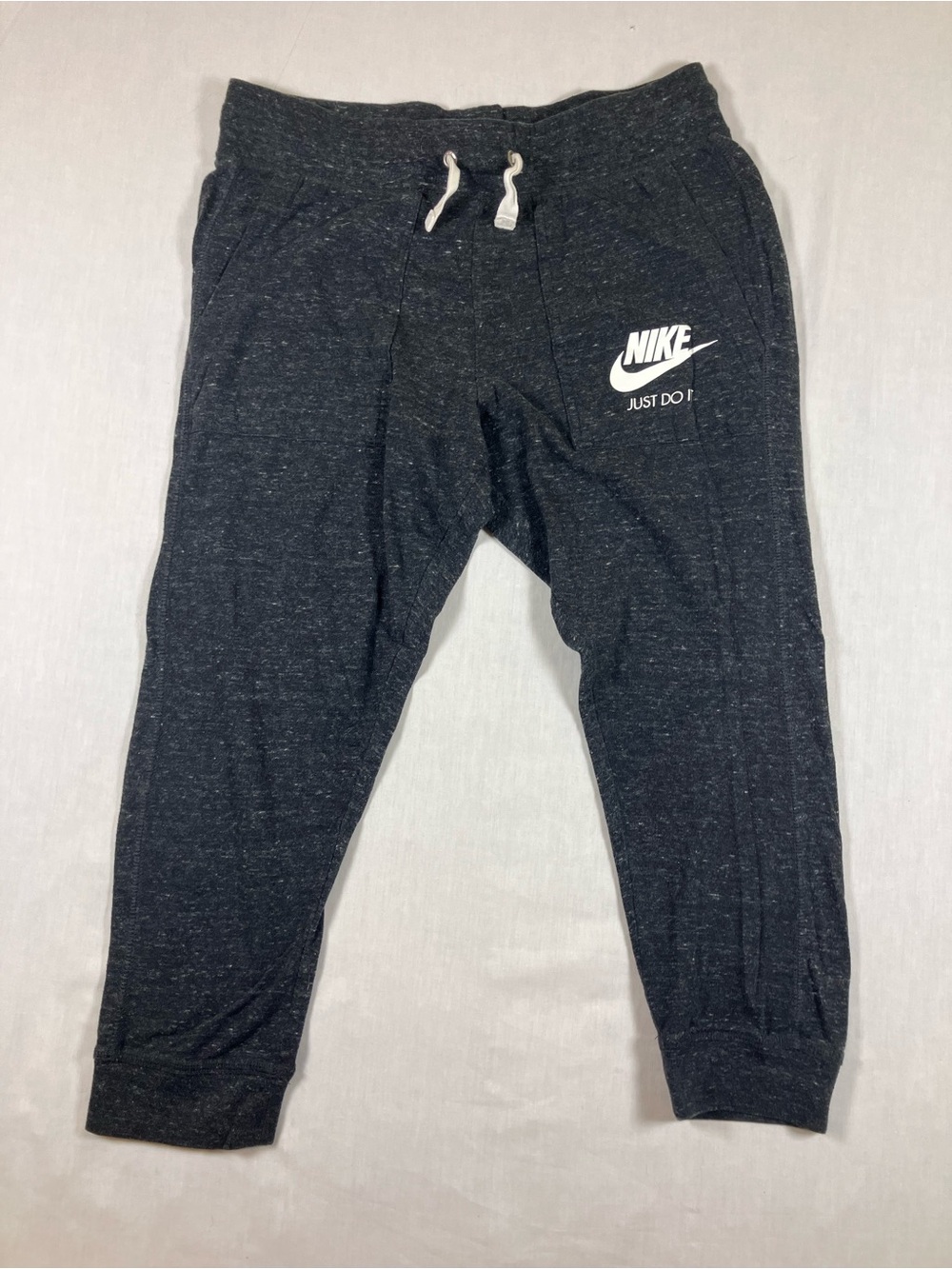 Nike Women’s Black Heather Jogger Pants with White Logo